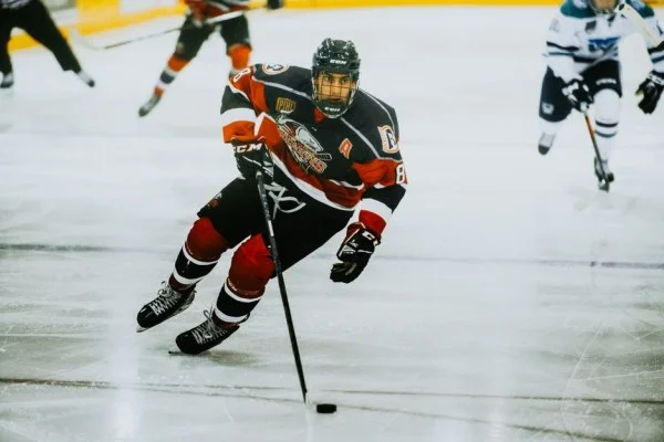 hockey player skating ice